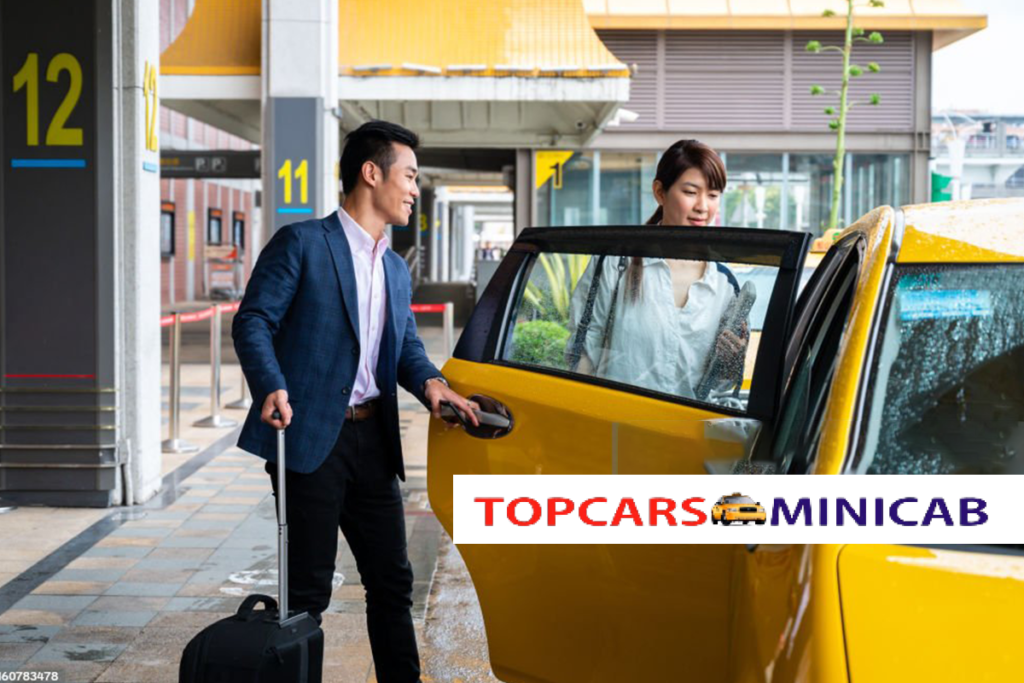 A fleet of top minicabs parked in UK, showcasing modern vehicles ready for passenger service - Heathrow Airport Terminal 2